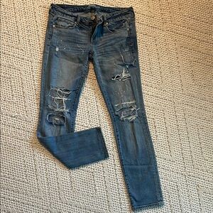 Distressed Blue Denim Jeans